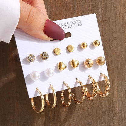 Gold geometric pearl earrings, trendy and party-ready.