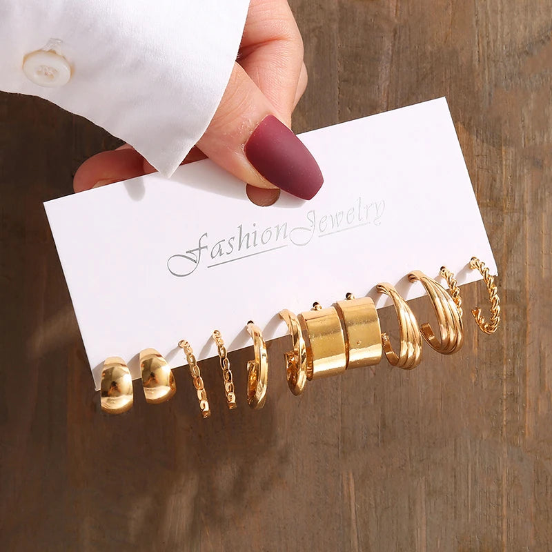 Gold geometric pearl earrings, trendy and party-ready.