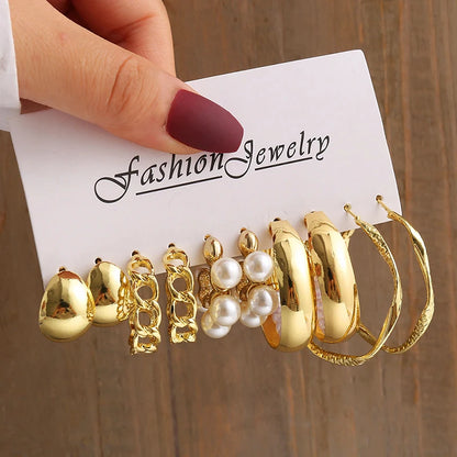 Gold geometric pearl earrings, trendy and party-ready.